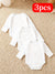 Three white baby bodysuits on a beige carpet with a '3pcs' label.