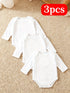 Three white baby bodysuits on a beige carpet with a '3pcs' label.