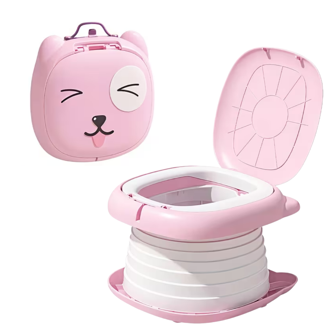 Pink children's potty with cartoon face design on a white background