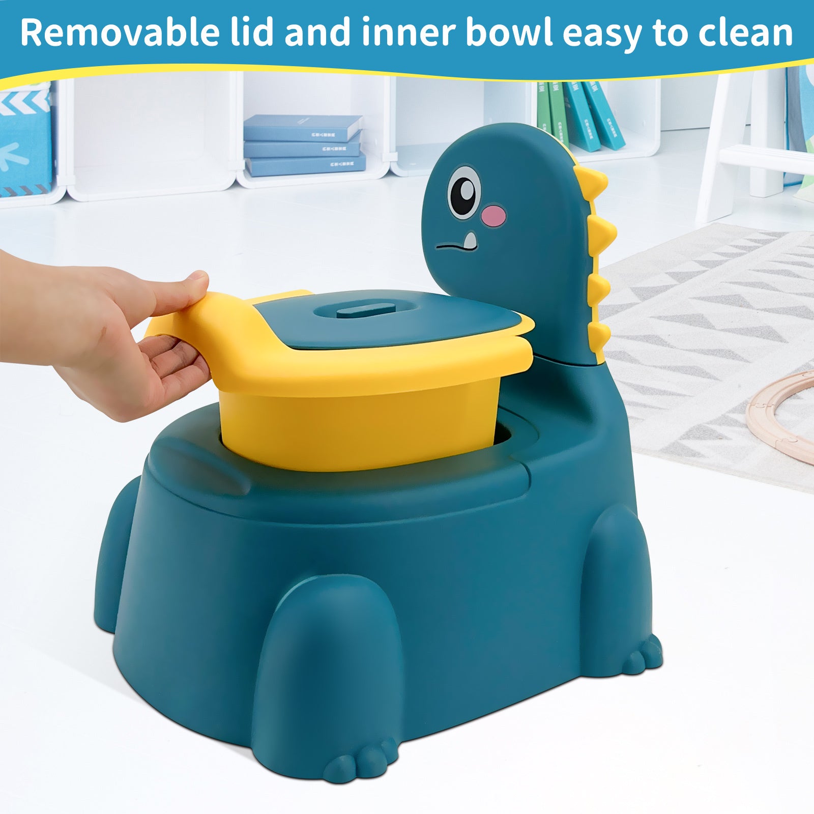 Children's potty training seat with dinosaur design and removable yellow lid.