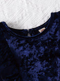 Navy blue velvet fabric with a textured white background