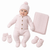 A baby wearing a light pink cable-knit one-piece outfit with a matching knit hat, mittens, booties, and a folded blanket on a plain white background.