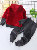 Red and gray children's hoodie and pants set on a white background with a grid pattern.