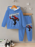 Blue children's hoodie and pants set with superhero design on a hanger against a gray wall.