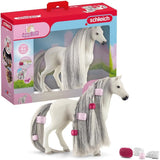 Schleich horse figurine with detailed mane and packaging on a white background