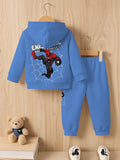 Blue children's hoodie and pants set with superhero design on a wooden background