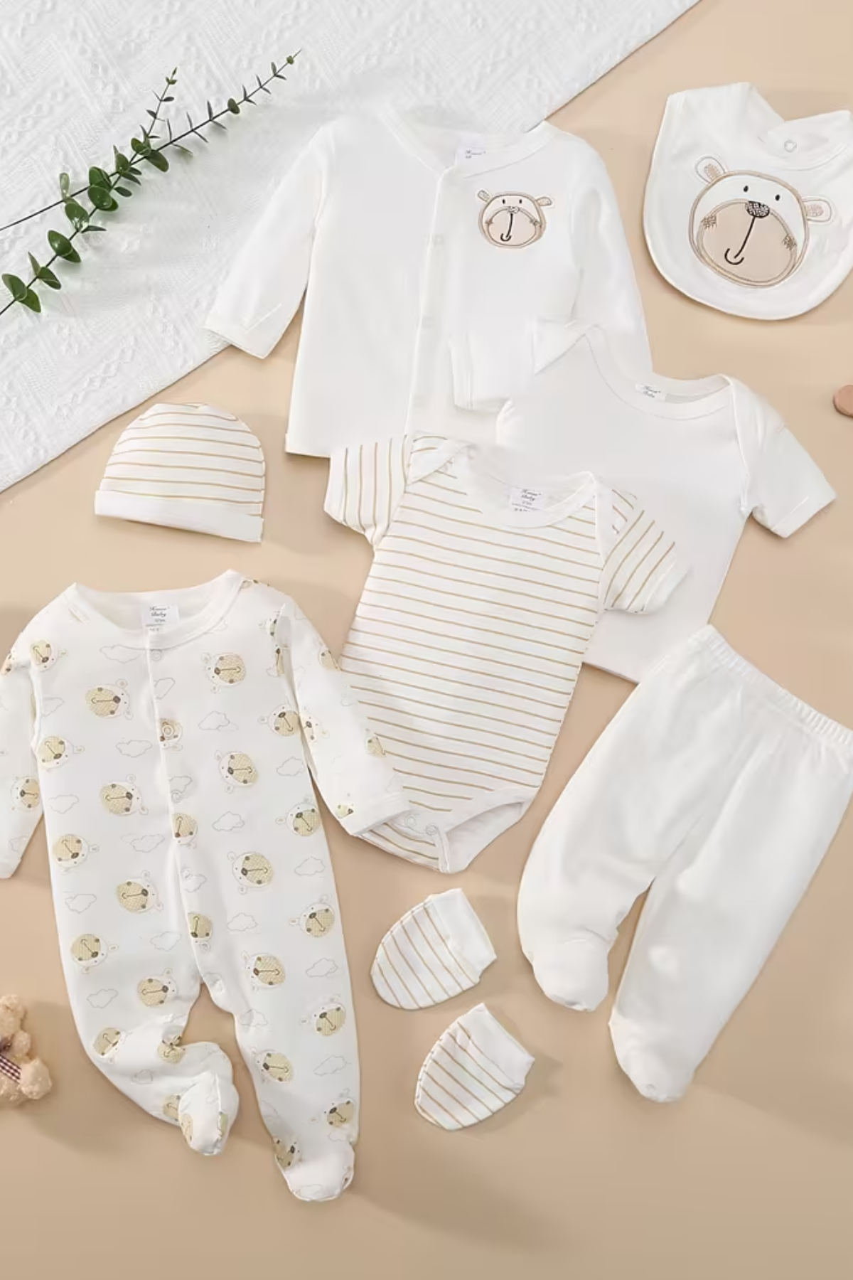 8-piece unisex newborn baby outfit set with Happy Little Bear print, including romper, jacket, pants, hat, bib and socks in neutral colors