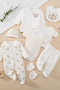8-piece unisex newborn baby outfit set with Happy Little Bear print, including romper, jacket, pants, hat, bib and socks in neutral colors