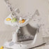 White pet shower with fruits on a light gray background