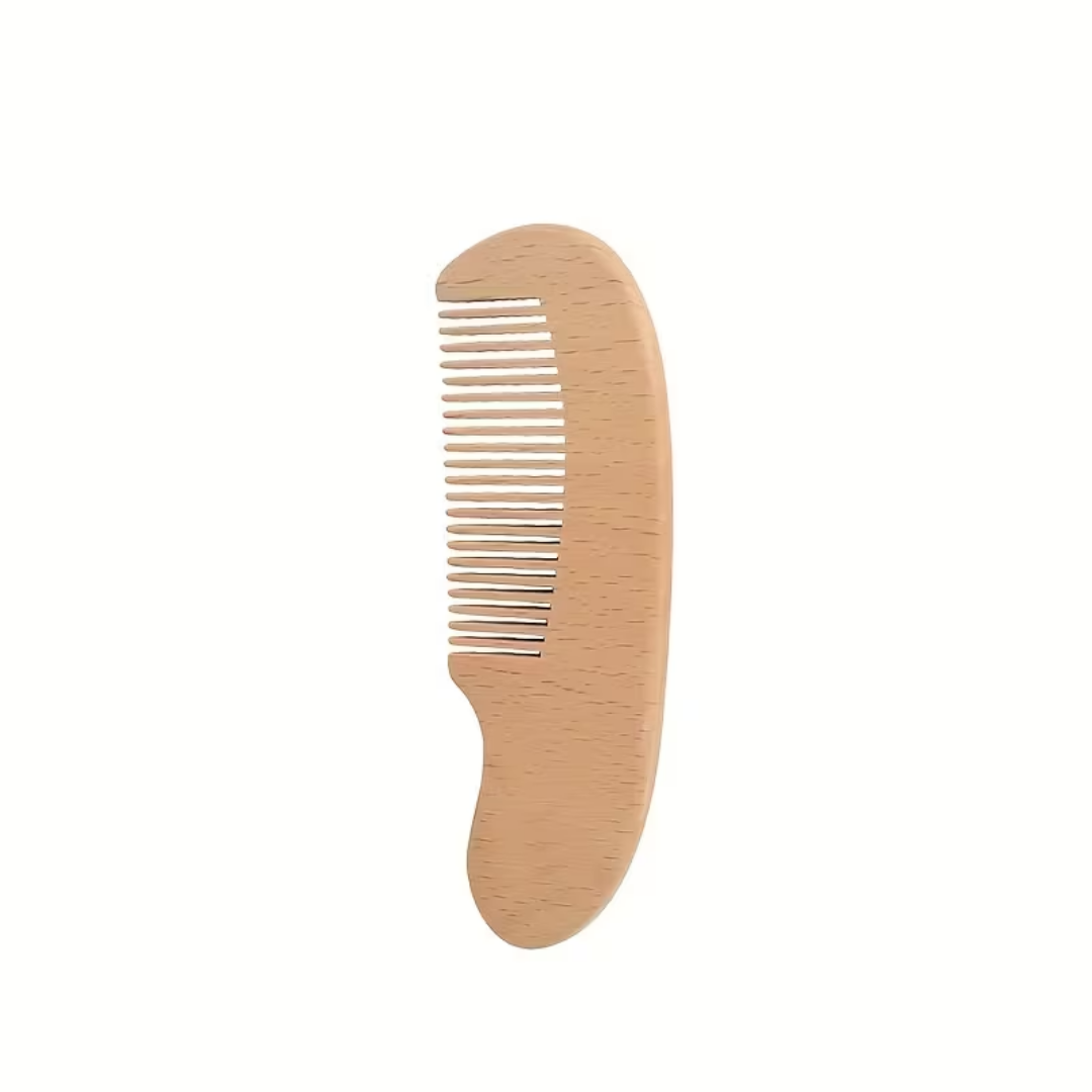 Wooden comb on a white background