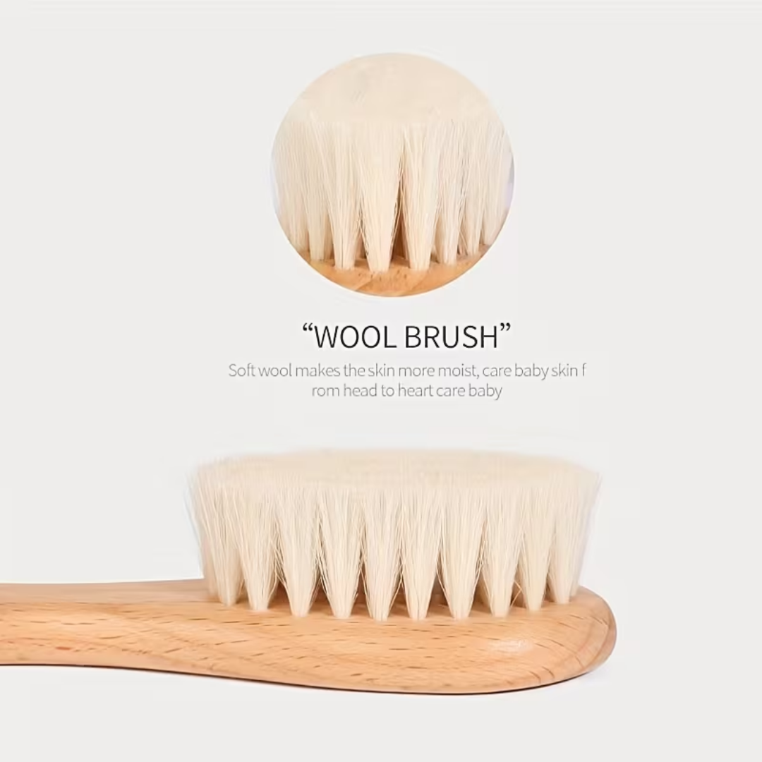 Wooden brush with soft wool bristles on a white background