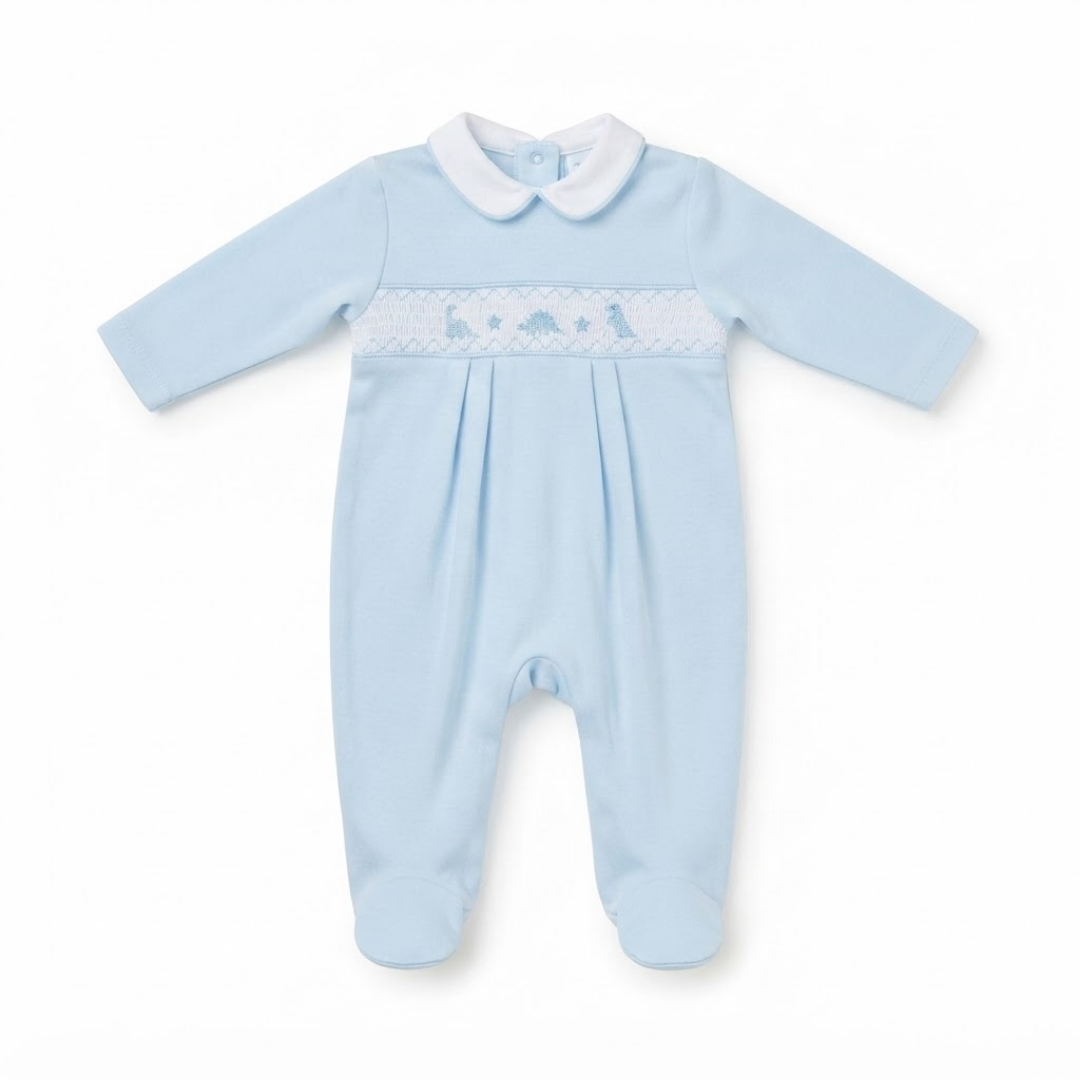 A baby's long-sleeve footed sleeper in light blue, featuring a white Peter Pan collar and a smocked chest band with embroidered birds and animals.