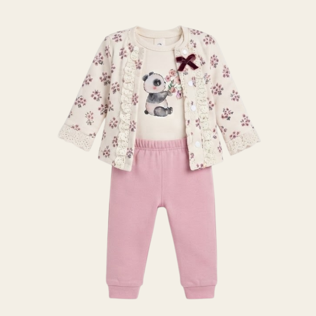 A toddler girl's three-piece outfit set featuring a cream-colored short-sleeve cardigan with pink floral prints and lace trim, a matching cream t-shirt with a cute panda graphic, and light pink sweatpants.