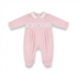 A light pink baby footed romper with long sleeves, a white Peter Pan collar, and a smocked chest panel featuring a small embroidered crown.