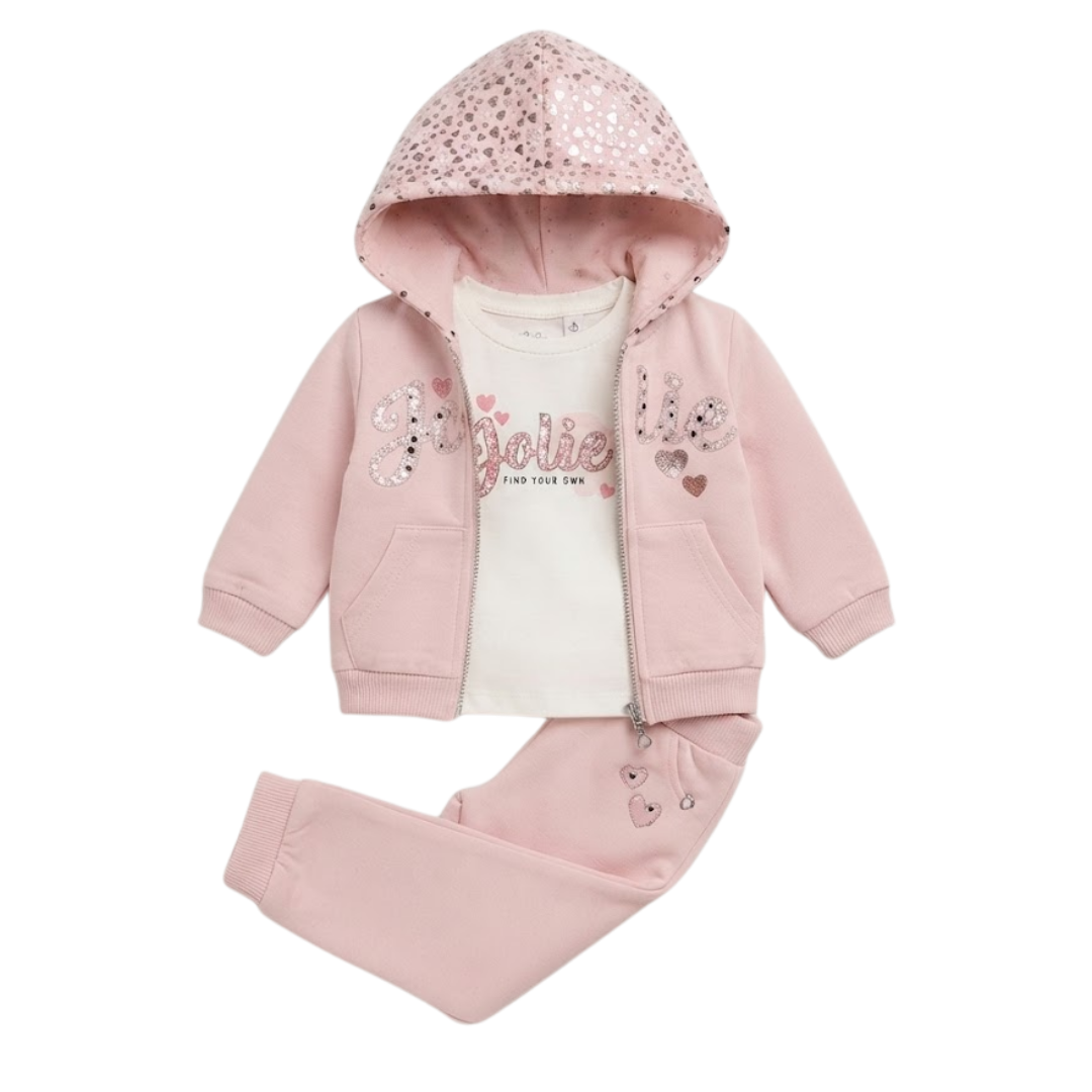 A toddler girl's two-piece pink outfit set featuring a zip-up hoodie with a sequined glittery hood and decorative text on the front, paired with matching jogger pants and a white t-shirt underneath.