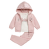 A toddler girl's two-piece pink outfit set featuring a zip-up hoodie with a sequined glittery hood and decorative text on the front, paired with matching jogger pants and a white t-shirt underneath.