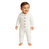 A baby two-piece knit outfit set laid flat on a cream satin fabric background. The set includes a long-sleeve top with a white body, light blue yoke and cuffs, and a blue train graphic on the chest, paired with matching light blue pants with white cuffs.