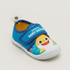A children's slip-on shoe featuring the Pinkfong Baby Shark character. The shoe has a bright blue upper with a white velcro strap displaying 'pinkfong BABY SHARK' in white text, a yellow and white shark graphic on the side, and a white flexible sole.