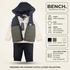 A children's clothing set from BENCH. featuring an olive green and cream colorblock hooded coat, a cream t-shirt, dark navy jeans, and a matching dark navy hoodie.