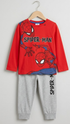 Spider-Man children's outfit with red shirt and gray pants on a hanger against a light gray background