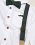 Green bow tie and suspenders on a white shirt with brown buttons.