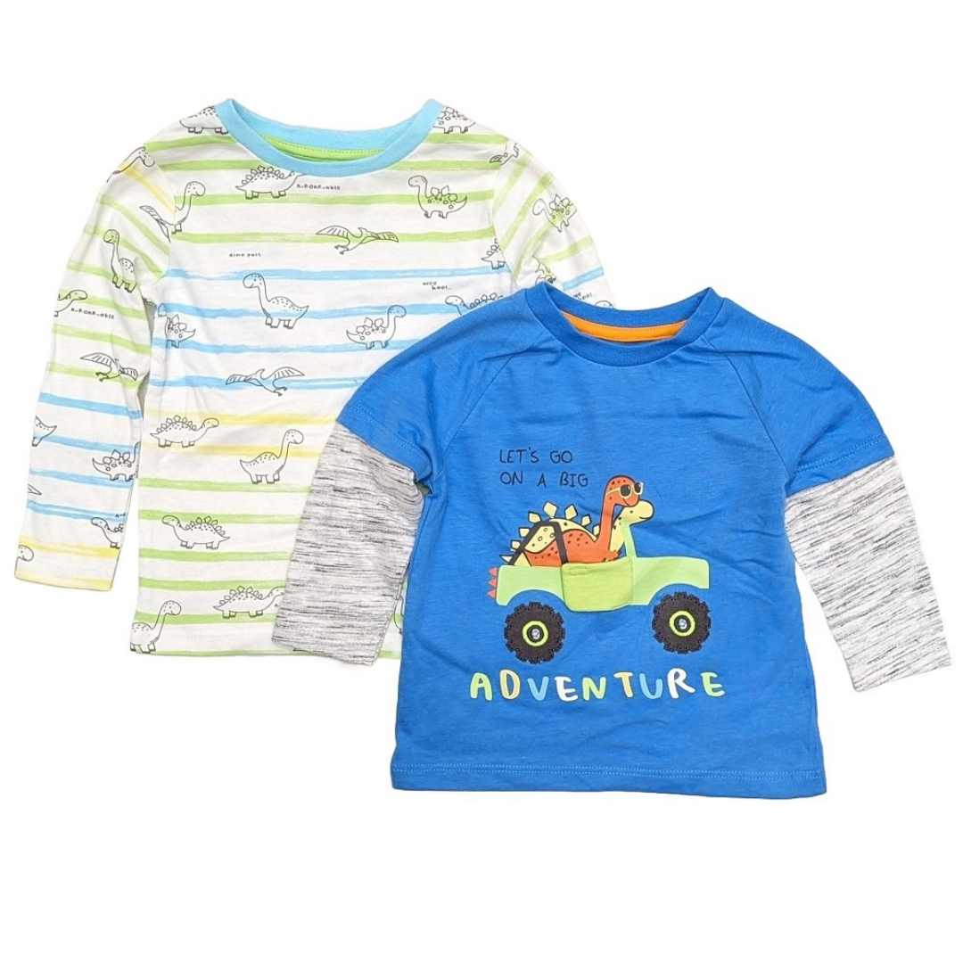 Two children's long-sleeve shirts shown on a white background. The back shirt has light blue and green horizontal stripes with a dinosaur print.