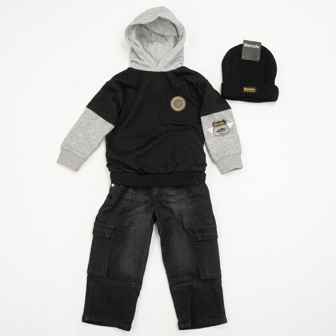 A children's outfit set laid flat on a white background, including a black and gray hooded sweatshirt, dark gray cargo pants, and a black knit beanie. The brand name 'Sencks' is visible on the tags of the beanie and the sweatshirt.