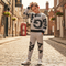 A boy wearing  Grey Graffiti Print Tracksuit standing in England street