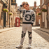 A boy wearing  Grey Graffiti Print Tracksuit standing in England street