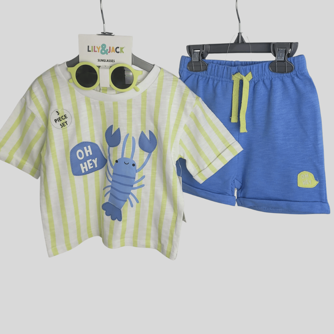 Children's clothing set with striped shirt and blue shorts on hangers, featuring a 'Lilly & Jack' brand tag.