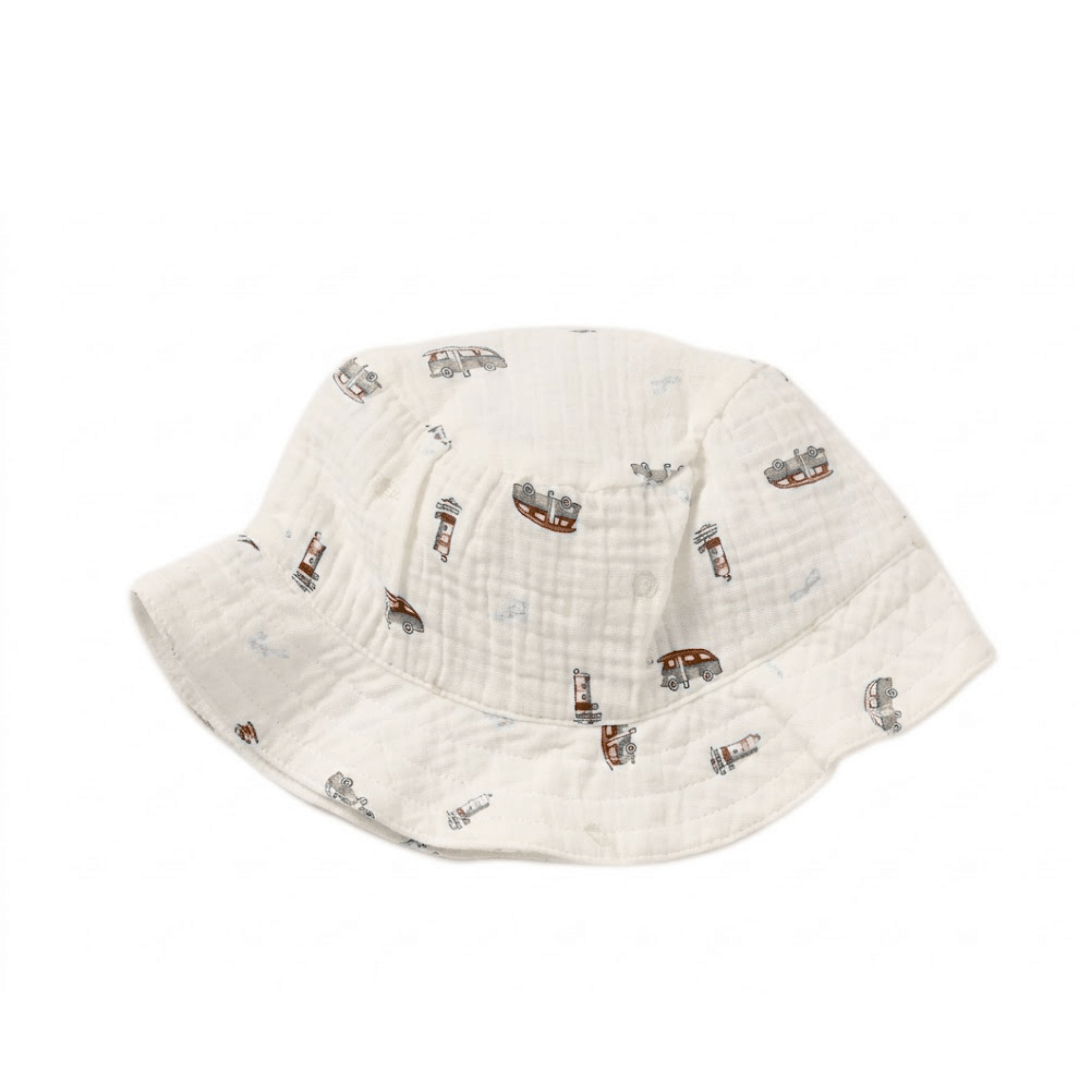 White bucket hat with ship pattern on a white background