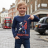 A boy wearing Boys Navy Spider-Man Long Sleeve Cotton Top standing on the road