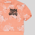 Peach-colored sweatshirt with white abstract patterns and black 'MAKE WAVES' text on a light gray background