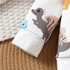 Children's socks with cartoon designs on a textured surface