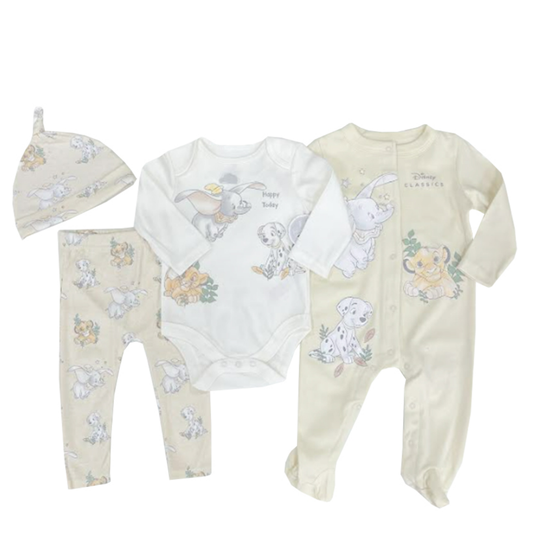 A 4-piece baby clothing set featuring a white long-sleeve bodysuit, a cream footed one-piece, matching cream leggings, and a matching cream bonnet, all decorated with Disney Dumbo illustrations on a white background.
