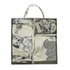 Set of baby clothing with cartoon designs in a box packaging.