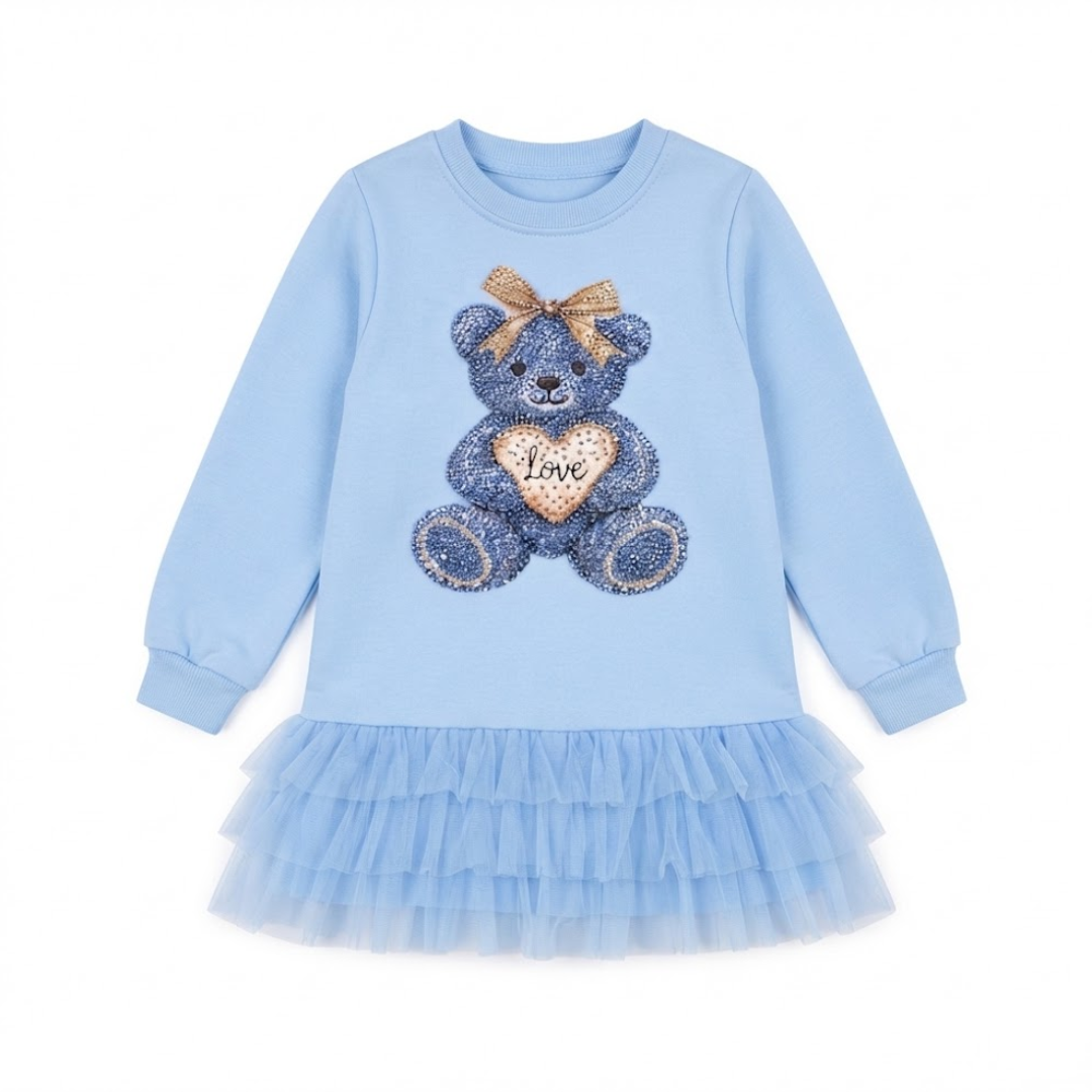 A light blue long-sleeve dress for toddlers featuring a sequined blue teddy bear with a gold bow and a gold heart that says 'Love' on the front, finished with a light blue ruffled tutu skirt.