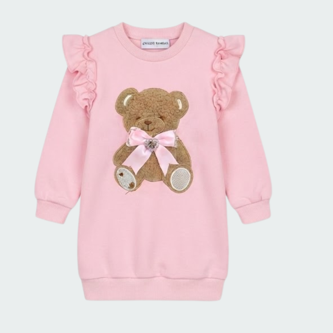 A two-piece girls' outfit set in light pink, featuring a long-sleeve top with ruffle details, a sequined Eiffel Tower design, and 3D floral embellishments, paired with matching pink leggings that have bow accents at the ankles.