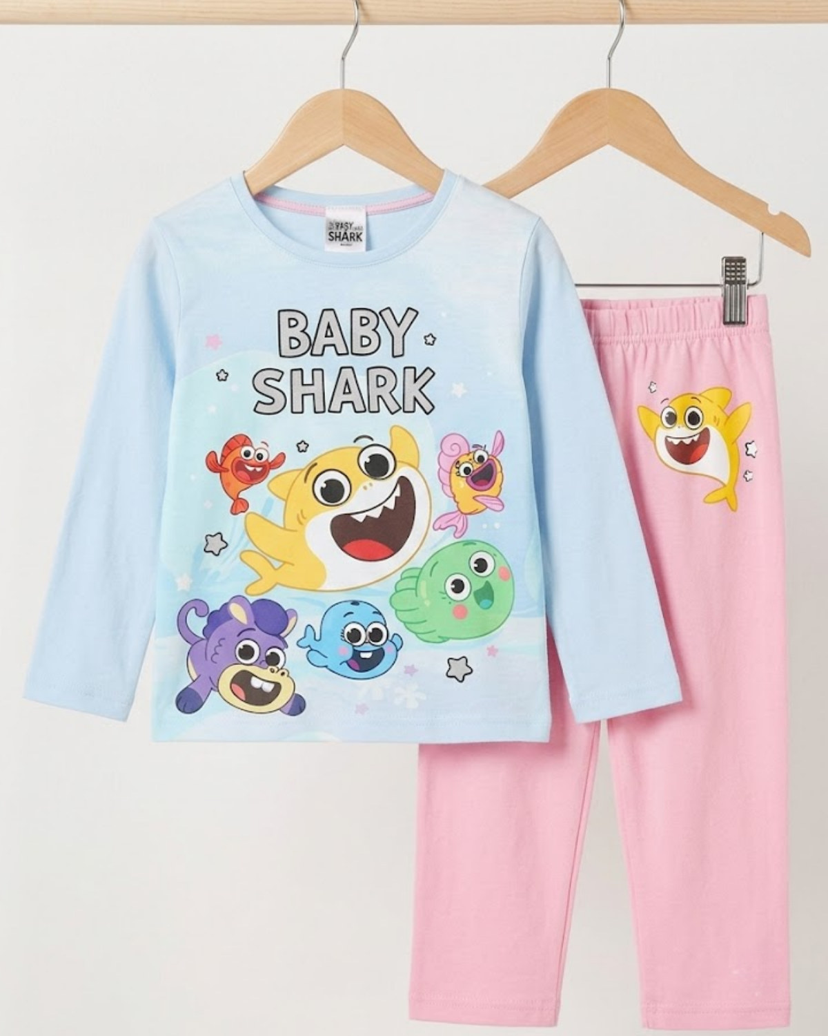 Children's pajama set with 'Baby Shark' design on a white background