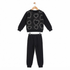 A two-piece children's outfit set consisting of a black long-sleeve sweatshirt with a heart pattern and matching black sweatpants, displayed on a wooden hanger against a white background.