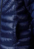 Close-up of a blue puffer jacket with quilted texture