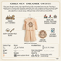 An infographic for a girls' two-piece outfit set titled 'Girls New Dreamer Outfit,' showing a peach-colored dress and matching top with printed circular graphics. The layout includes descriptive text, icons for school, playtime, and machine washability, and a specifications section with size and care details.