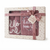 A boxed gift set containing a pink knit sweater and matching blanket. The set is packaged in a cream-colored box with floral patterns, a pink ribbon, and a bow, with the words 'Nook a Lye Body' and 'hello world' visible on the packaging.