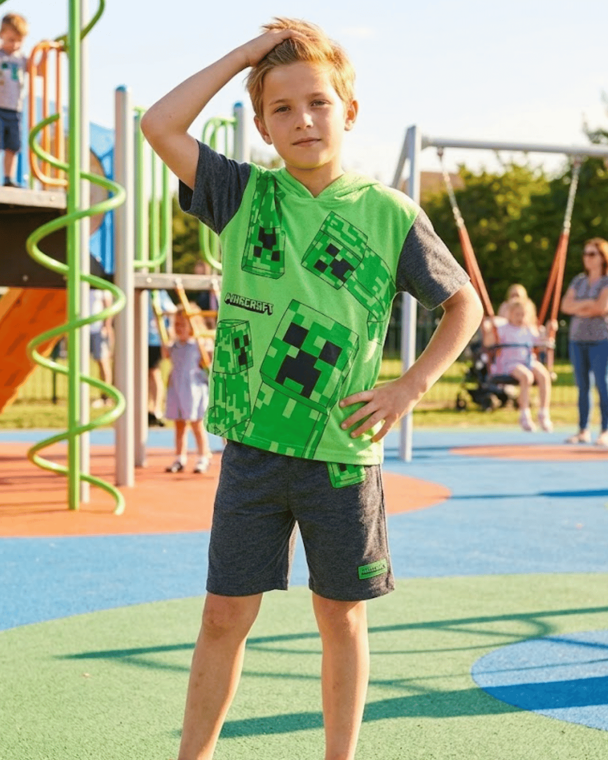 Child wearing a green Minecraft shirt on a playground