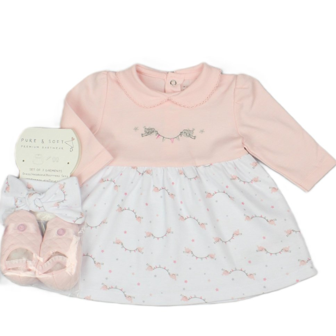 A baby girl's two-piece outfit set featuring a light pink long-sleeve top with a embroidered angel motif and a white skirt printed with a pink and gray string lights pattern. Includes a pair of matching pink booties and a branded tag on a white background.