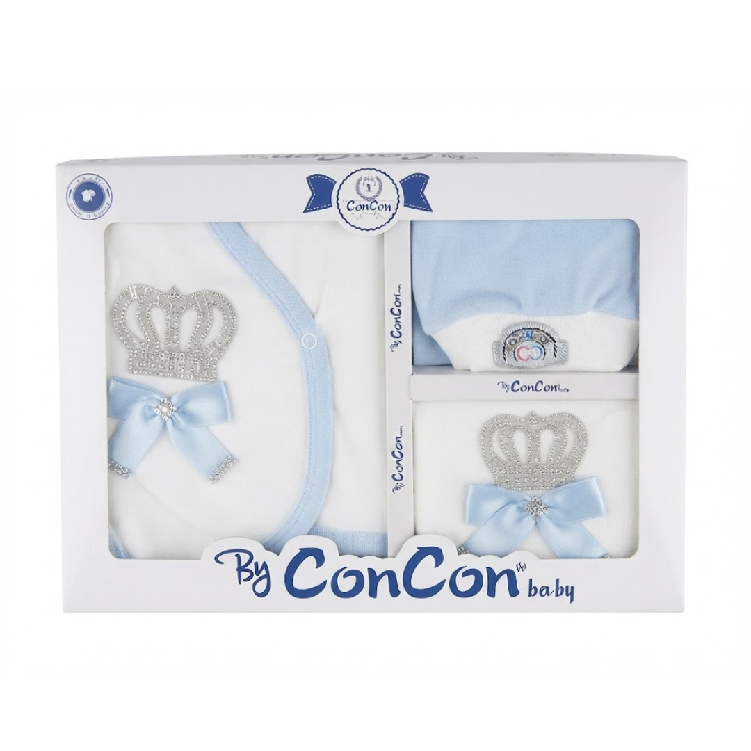 A boxed baby gift set by ConCon baby, containing a white and light blue baby outfit with a silver glitter crown and bow, along with two matching accessories in a white gift box with ConCon branding.