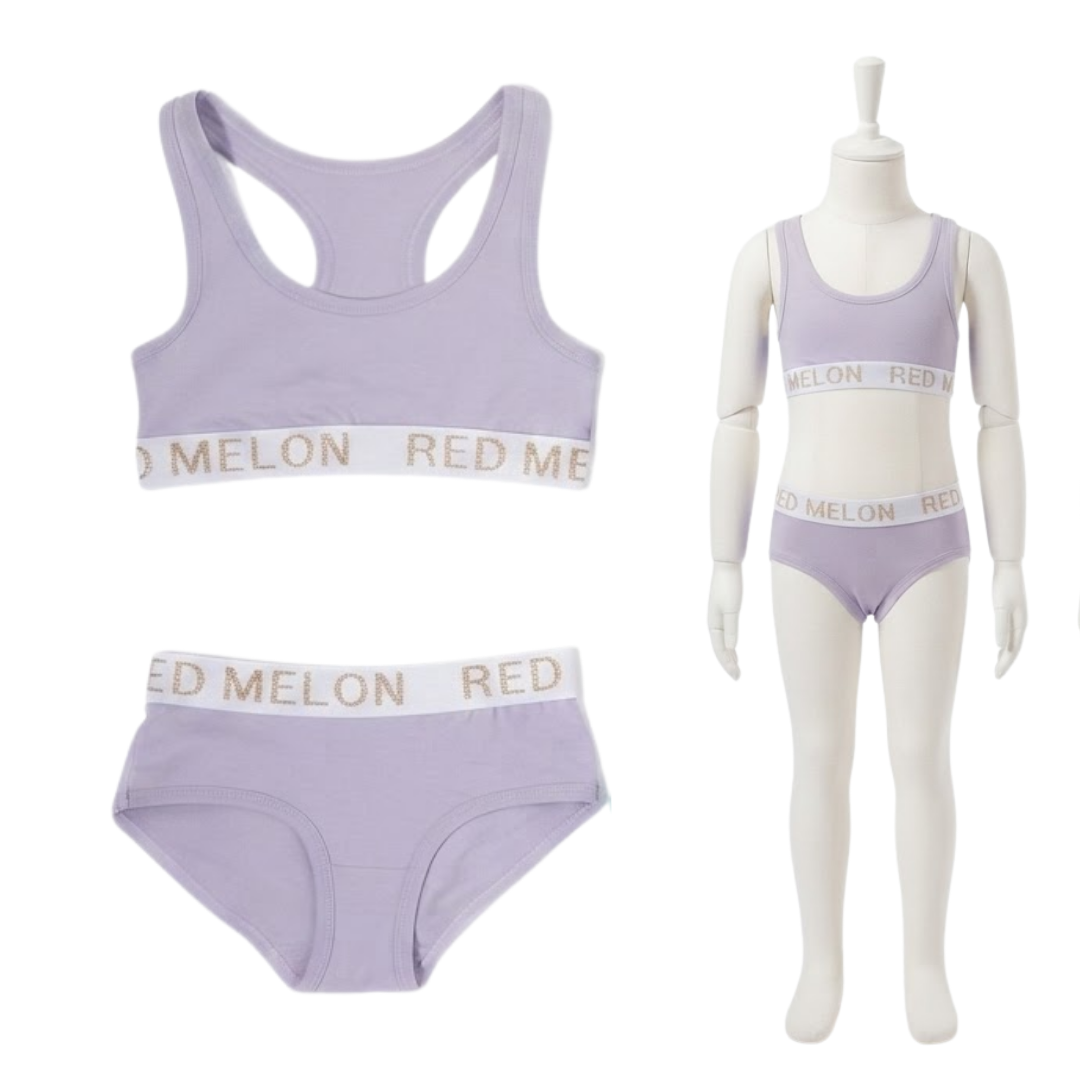 A two-piece women's underwear set in light lavender purple, shown both flat and on a white mannequin. The set includes a racerback-style sports bra and matching briefs.
