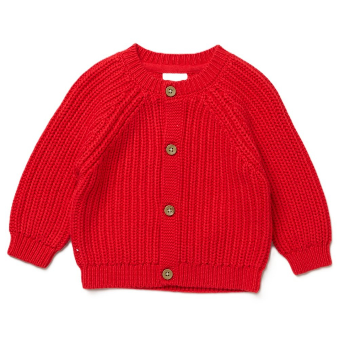 A bright red chunky knit cardigan sweater for toddlers, featuring a round neckline, raglan sleeves, and a front button closure with brown buttons, shown flat on a white background.