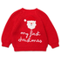 A red knit baby sweater with a white and red Santa face and the words 'my first christmas' knitted on the front, shown against a plain white background.