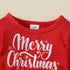 Red baby onesie with 'Merry Christmas' text on a beige background
